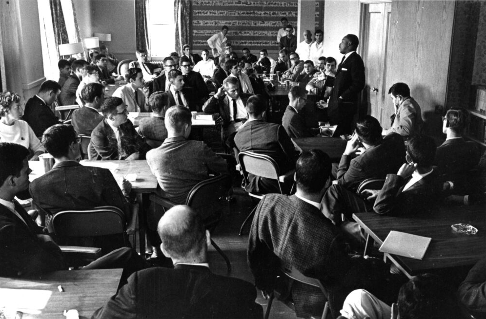 Dr. Martin Luther King Jr. speaking to a packed room of students at Wesleyan University, mostly white, in the 1960s. Here he was talking at the college of social studies. 
